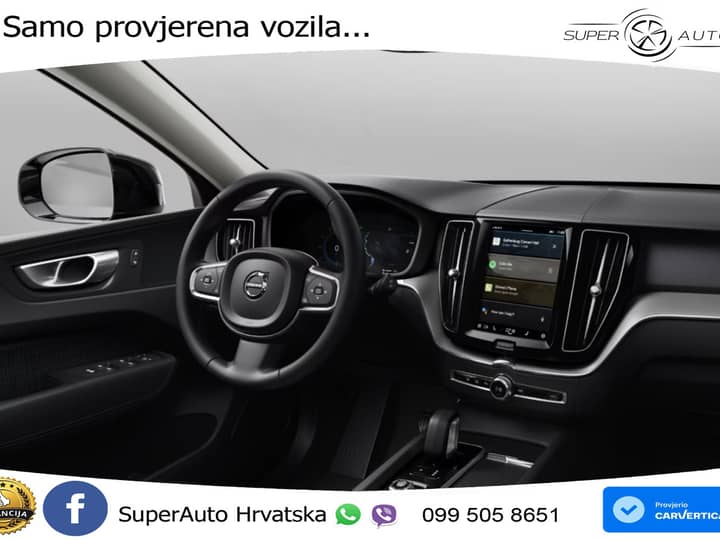 Slika prikazuje unutrašnjost vozila (volan i instrument ploča).