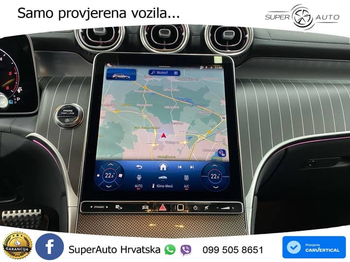 Slika prikazuje unutrašnjost vozila (navigacijski zaslon).