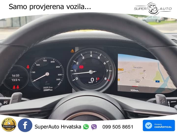 Slika prikazuje unutrašnjost vozila – kokpit i instrument ploča.