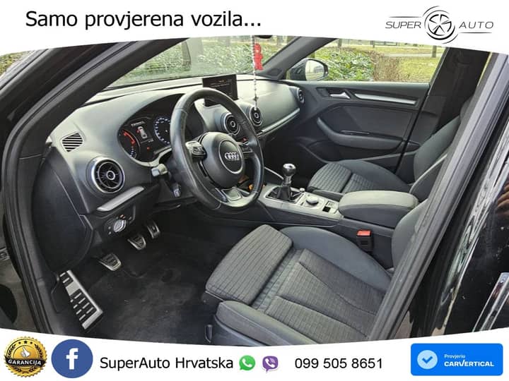 Slika prikazuje unutrašnjost automobila (volan, sjedala).
