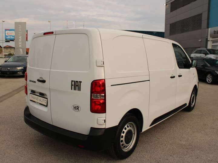 Slika prikazuje vanjski dio vozila (kombi).